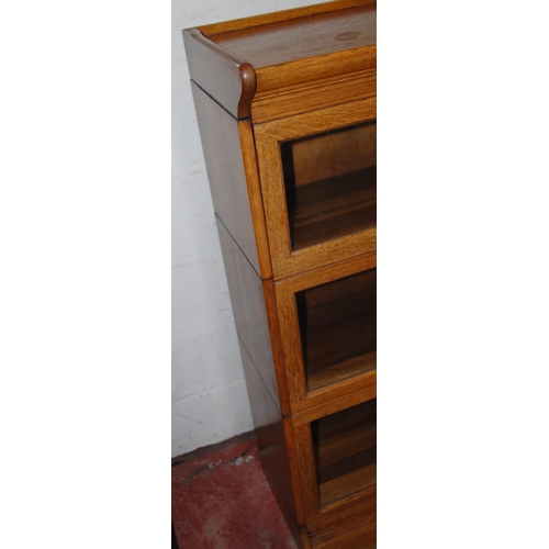 374 - Oak stacking bookcase with detachable cornice above three glazed sections, on base, 124cm high, 87cm... 