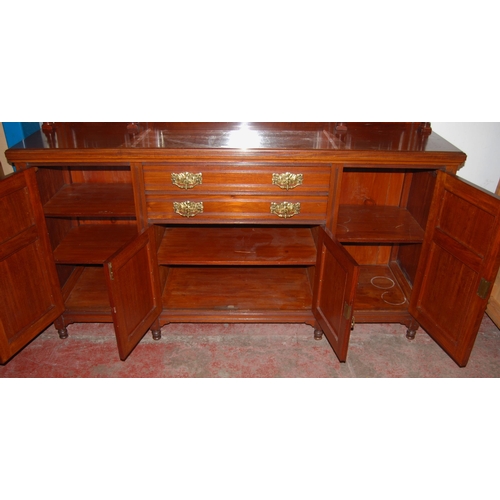 376 - Edwardian mahogany mirror-back sideboard, the carved mirror back on balustrade columns above a sideb... 