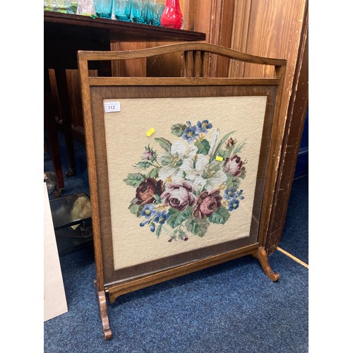 312 - Fire screen with floral tapestry, in oak frame, 74cm x 58cm.