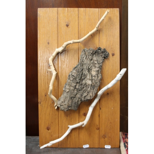 277 - Driftwood sculpture and a driftwood wall plaque, along with water gourd, largest 80cm.