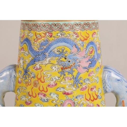 259 - Pair 20th century Chinese famille rose, yellow ground vases, tapered form with applied elephant mask... 