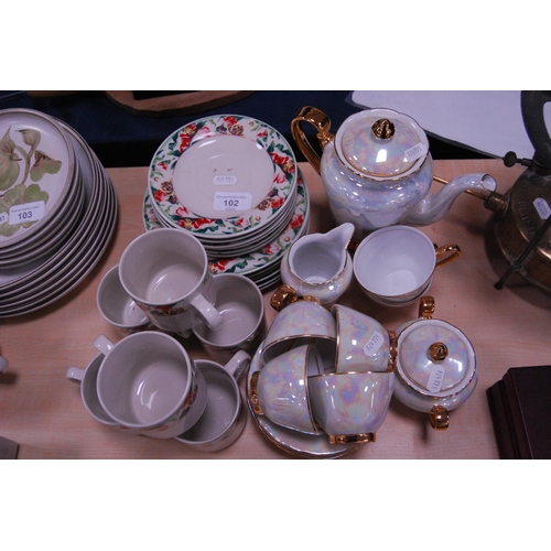 79 - Czechoslovakian lustre part tea set, and a part tea and dinner set.