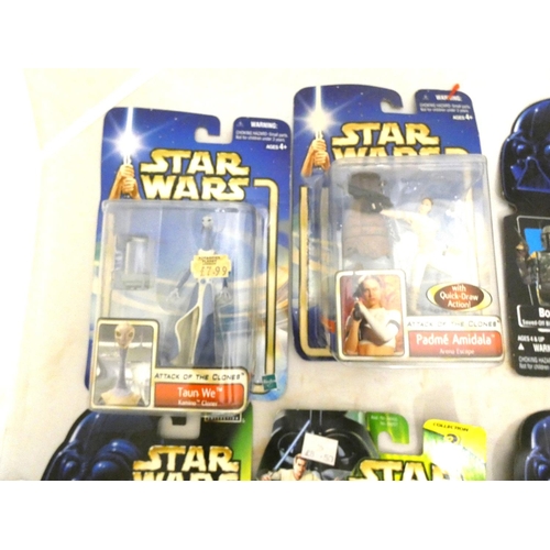 11 - Box of Hasbro and Kenner Star Wars figures to include Luke Skywalker, Princess Leia etc, on card.