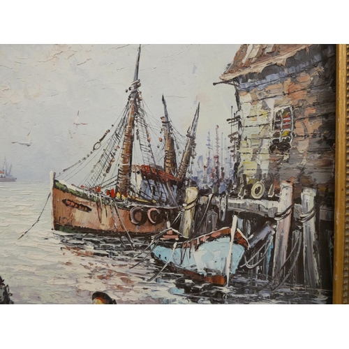 63 - Large gilt frame, oil on board fishing village scene, signed.