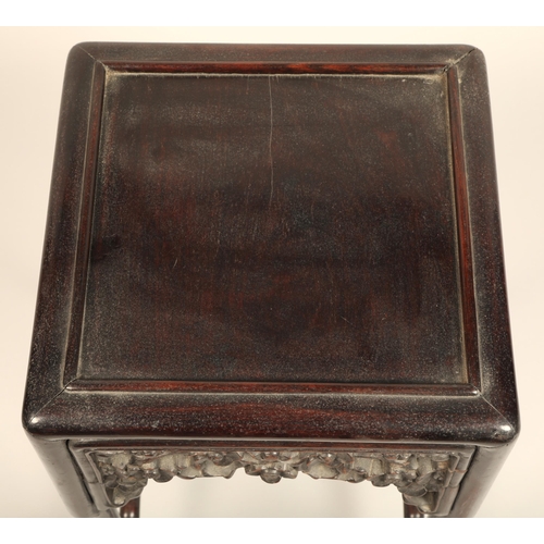 616 - Nest of four Chinese hardwood tables, rectangular painted tops with raised moulded edges above a fri... 