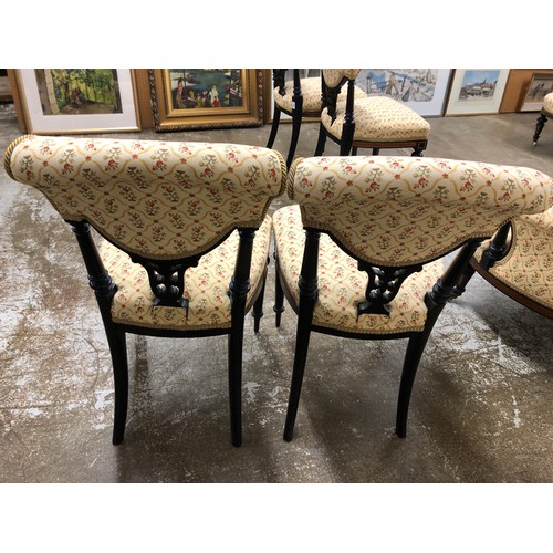 635 - Victorian ebony and burr walnut drawing room suite consisting of a scroll end settee, two arm chairs... 