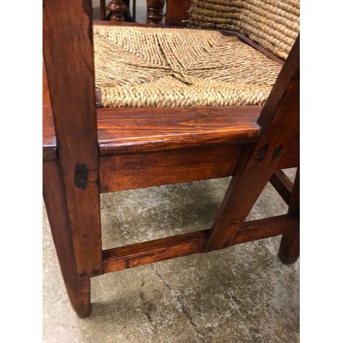 621 - Early 20th century pine framed Orkney chair with rush seat back (revarnished) length 60cm, height 10... 