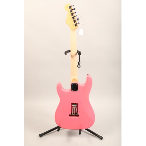 401 - Pink and black coloured six string electric guitar