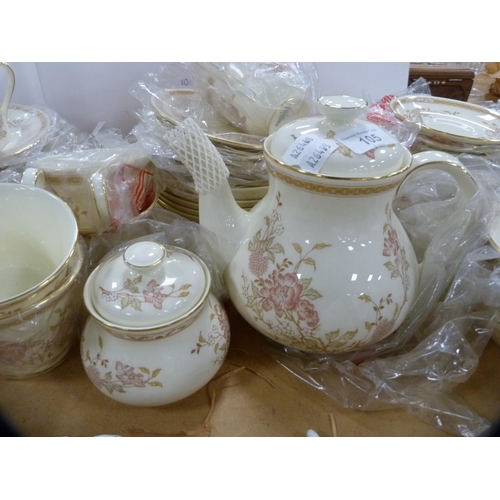 105 - Collection of Royal Doulton 'Lisette' pattern tea and coffee wares, some in original outer bags.