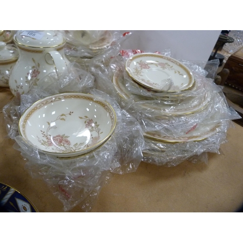 105 - Collection of Royal Doulton 'Lisette' pattern tea and coffee wares, some in original outer bags.