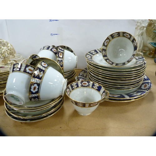 106 - Paragon part tea set and a Diamond part tea set decorated in the Imari palette. 