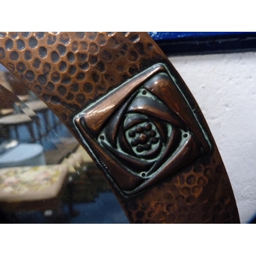 14 - Arts & Crafts-style hammered copper wall mirror with repoussé roundels, and a modern wall... 