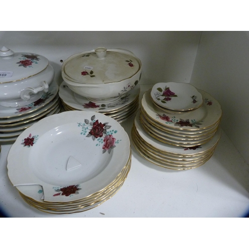 169 - Floral decorated part dinner set.