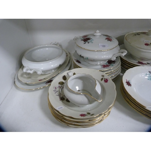 169 - Floral decorated part dinner set.