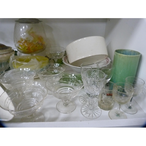 180 - Assorted glasses, claret jug, bowl, cylindrical vase, copper plaque etc (one shelf).