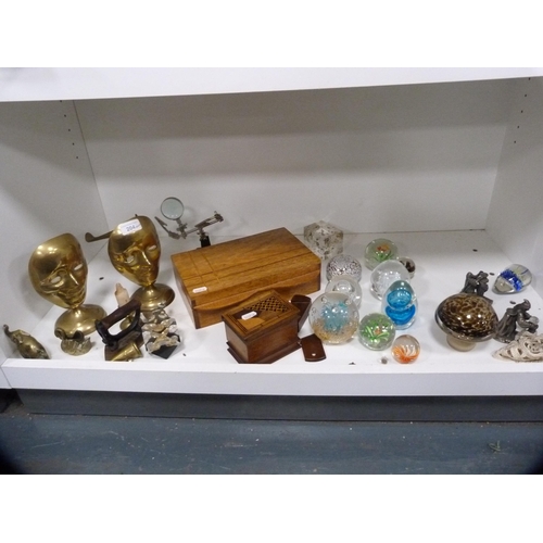 204 - Glass paperweights, inlaid box, brass ornaments, flat iron etc (one shelf).