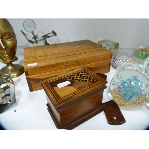 204 - Glass paperweights, inlaid box, brass ornaments, flat iron etc (one shelf).