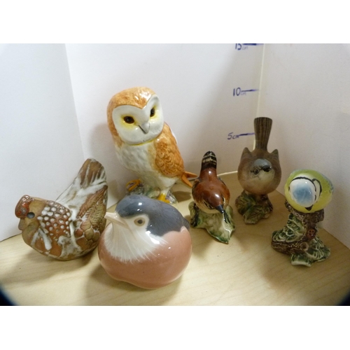 217 - Group of animal and other figures to include a Beswick wren, Beswick whitethroat, Beswick blue tit, ... 