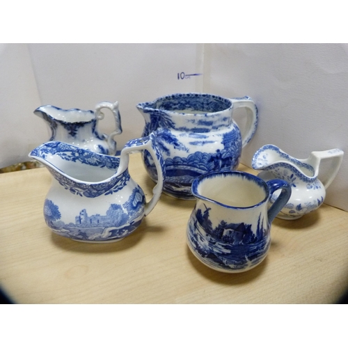 222 - Group of blue and white ceramics to include a Scottish carpet bowl, jug, butter dish, Copeland Spode... 