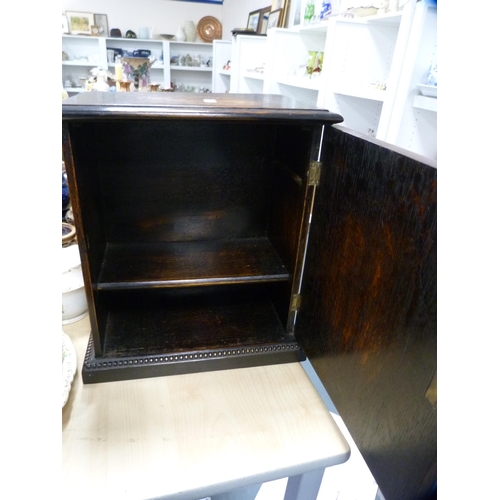 236 - Oak apprentice-style cupboard and a tray decorated with fruit and vines.  (2)