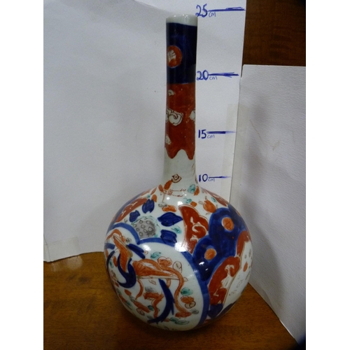 245 - Five pieces of antique Japanese Imari to include a bottle vase, plate, cylindrical vase and bowl.