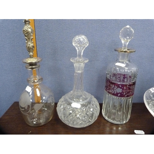 249 - Crystal and glass to include a Bohemian-style decanter and stopper, antique glass decanter with whit... 