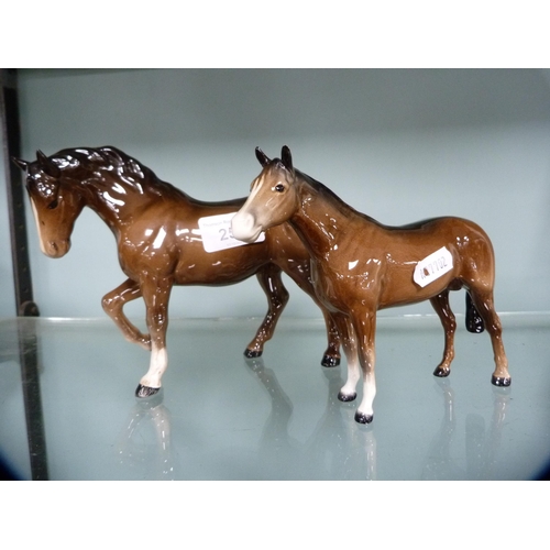 251 - Two Beswick figures of horses.  (2)