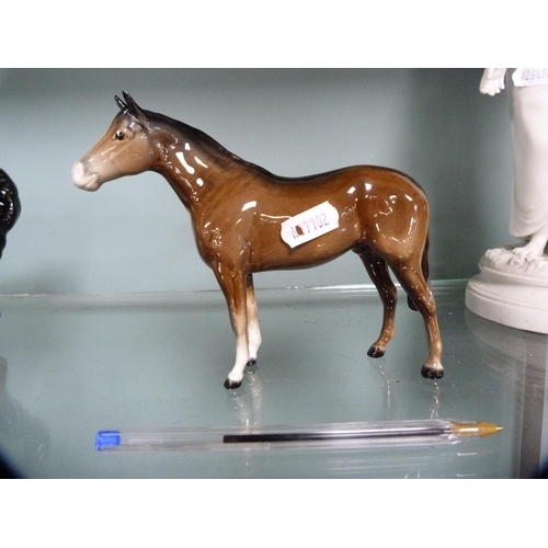 251 - Two Beswick figures of horses.  (2)