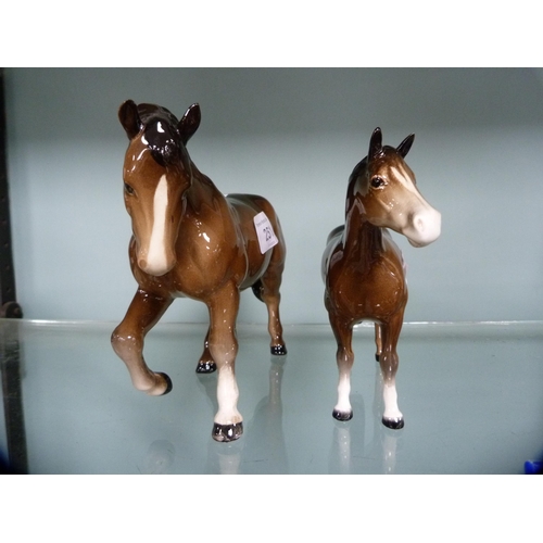 251 - Two Beswick figures of horses.  (2)