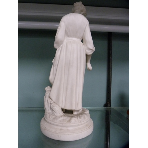 252 - Parian figure of a maiden standing on a naturalistic base, unsigned, and a resin figure of a cow on ... 