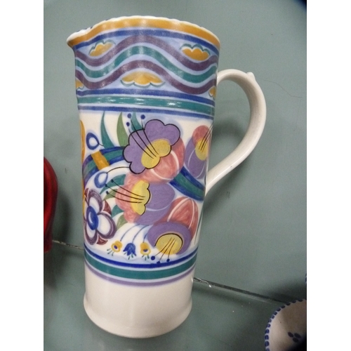 259 - Group of Poole Pottery to include a vase by Carter Stabler Adams, cylindrical spill vase, jug, prese... 