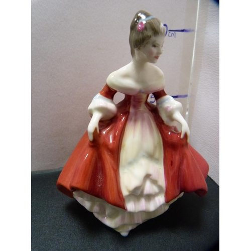 260 - Royal Doulton figures, 'Buttercup', 'Southern Belle' and a Spanish Nadal figure of a girl with a dog... 