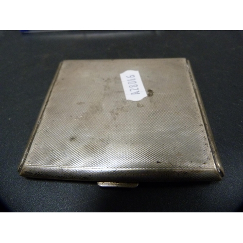 272 - Silver engine-turned cigarette case, hallmarks for Birmingham, approximately 124.8g.