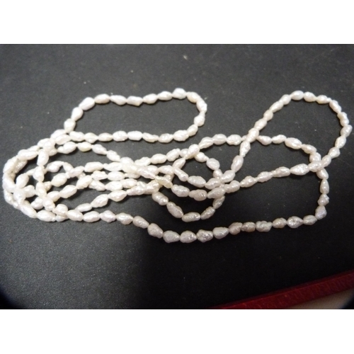 275 - String of freshwater pearls, a string of cultured pearls with sterling silver snap clasp and another... 