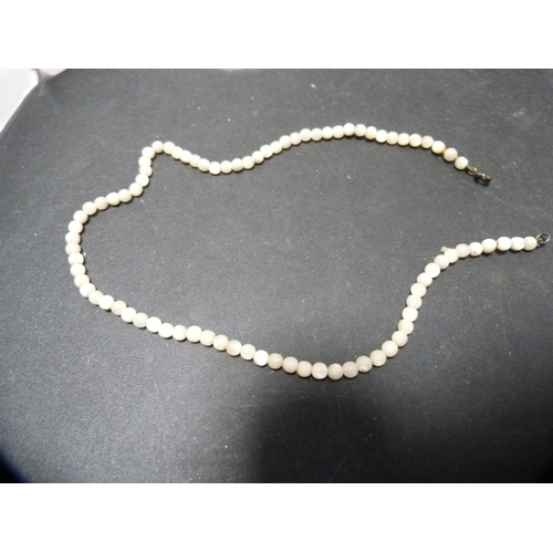 275 - String of freshwater pearls, a string of cultured pearls with sterling silver snap clasp and another... 