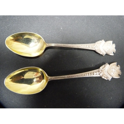 281 - Group of four similar coffee spoons, three monogrammed to the surmounts, and four EP spoons.  (... 