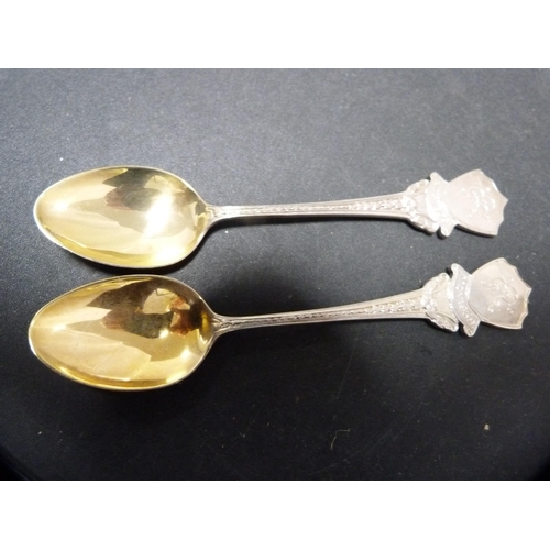 281 - Group of four similar coffee spoons, three monogrammed to the surmounts, and four EP spoons.  (... 