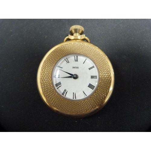 338 - Four Smith's pocket watches and a Roxedo antimagnetic pocket watch.  (5)