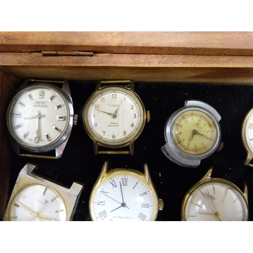 353 - Quantity of manual wind and automatic watch heads contained in a small display case to include Smith... 