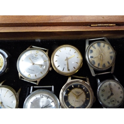 353 - Quantity of manual wind and automatic watch heads contained in a small display case to include Smith... 