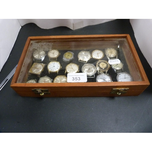 353 - Quantity of manual wind and automatic watch heads contained in a small display case to include Smith... 