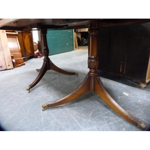 360 - Georgian-style twin-pedestal extending dining table.