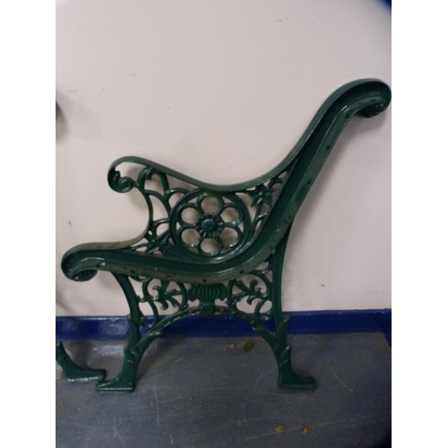 369 - Pair of Victorian-style green-painted metal garden bench ends and a Coalbrookdale-style garden chair... 