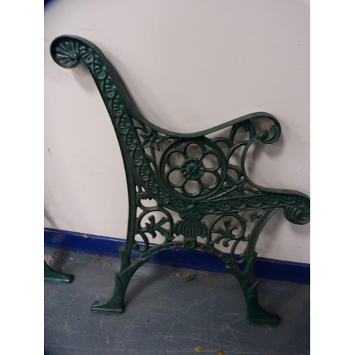 369 - Pair of Victorian-style green-painted metal garden bench ends and a Coalbrookdale-style garden chair... 