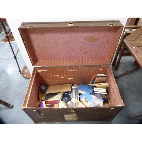 383 - Metal-bound travel trunk containing general books.