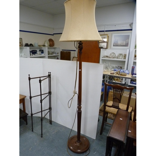 386 - Antique mahogany folding towel rail and a mahogany standard lamp with shade.  (2)