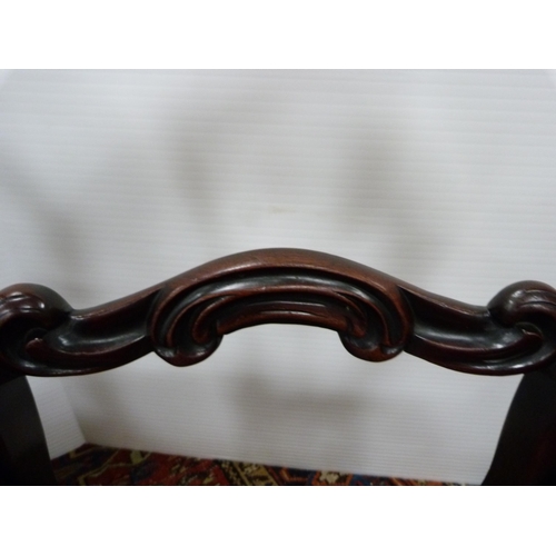 388 - Set of four Victorian mahogany dining chairs with scroll back rests and later stuff-over seats. ... 