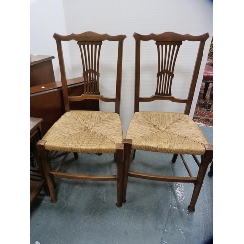 392 - Pair of woven-seat chairs, nest of two tables and an Edwardian Sutherland table.  (4)