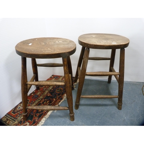 396 - Pine open carver chair and two farmhouse-style kitchen stools.  (3)