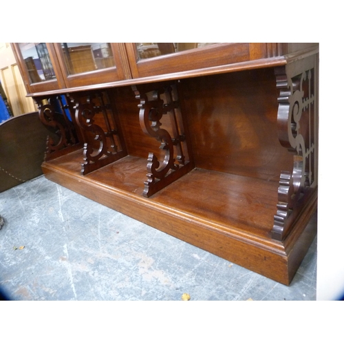 410 - Edwardian glazed three-door bookcase fixed to a converted base.